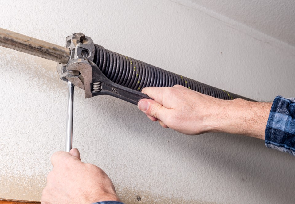 Garage Door Spring Repair Why Professionals Are Your Best Bet